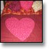 Hand sewn quilt/blanket with matching, heart-shaped pillows